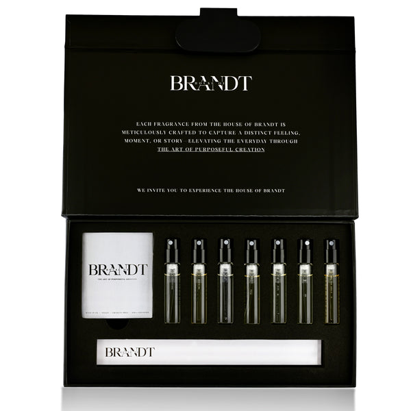 Brandt perfume set with bottles and a bottle in a black box on a white background